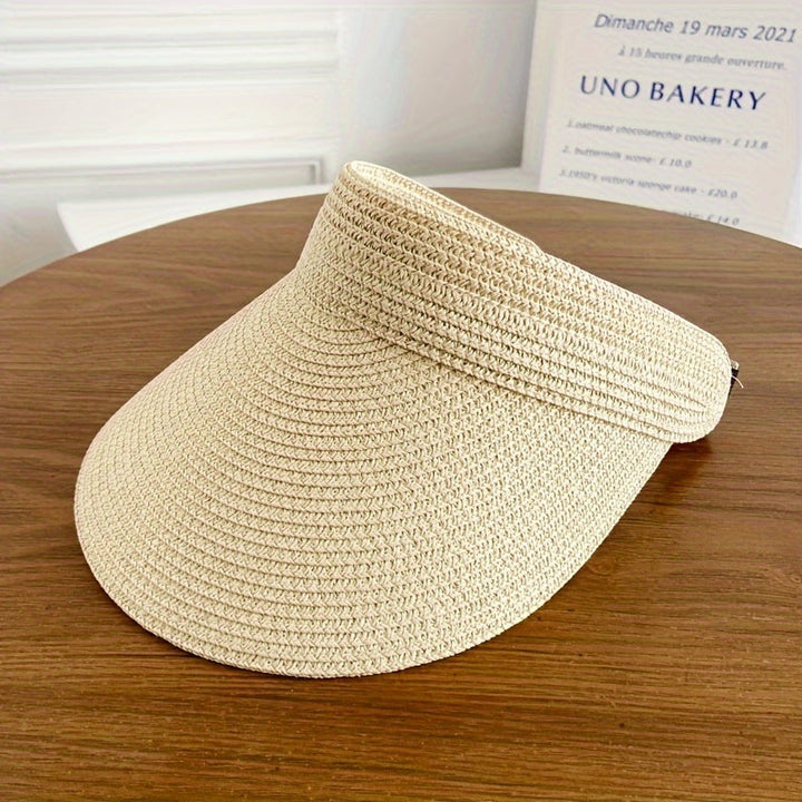 Elegant women's wide brim sun visor. Provides excellent UV protection, a must-have summer beach accessory.