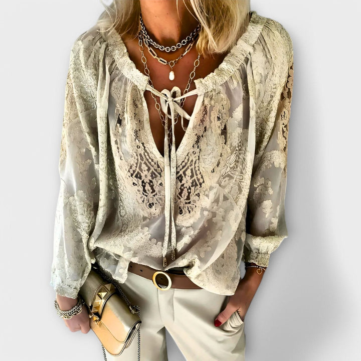 Pink elegant long-sleeve tie-neck blouse, offering effortless style and comfort for versatile wear.