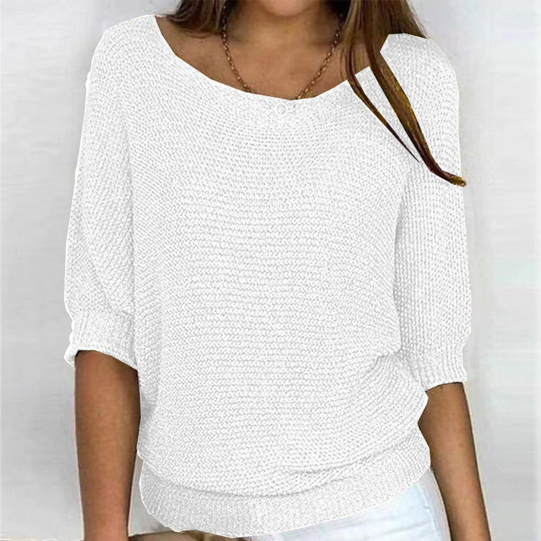 Cozy women's oversized batwing sweater, perfect long sleeve top for comfortable fall & winter fashion.