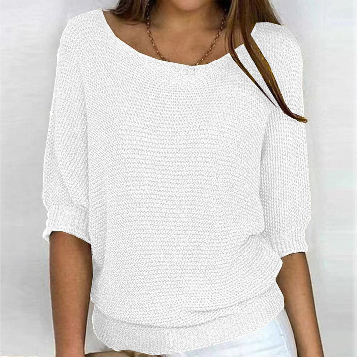 Cozy women's oversized batwing sweater, perfect long sleeve top for comfortable fall & winter fashion.