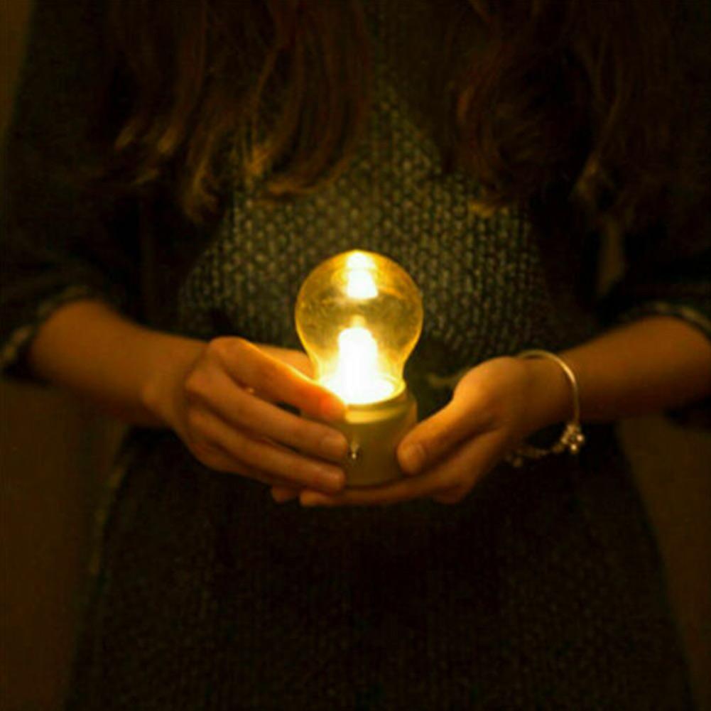 Nvroome Lights retro LED lamp. USB rechargeable portable light, ideal for desk, nightstand, or home accent.