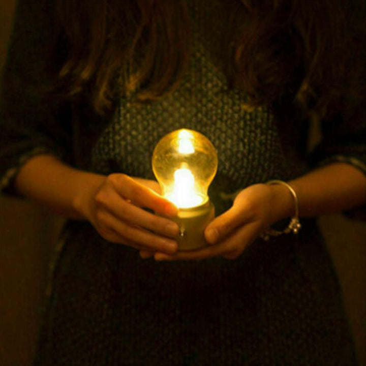 Nvroome Lights retro LED lamp. USB rechargeable portable light, ideal for desk, nightstand, or home accent.