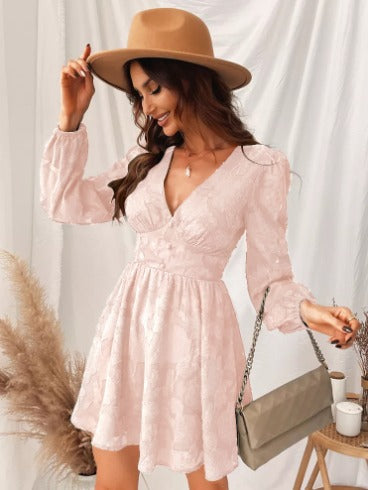 Stylish short party dress for women, showcasing elegant puff sleeves and a flattering V-neck, perfect for fashion-forward ladies.