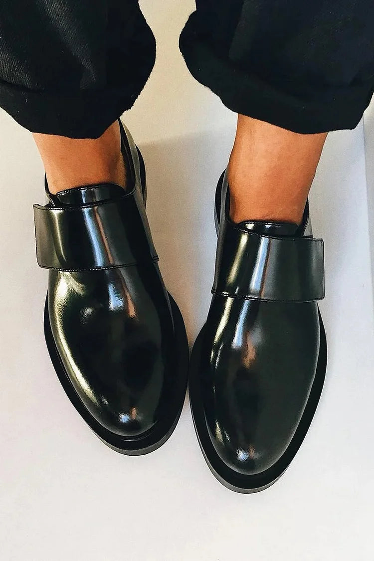 Elegant women's slip-on loafers, polished finish with chic strap detail. Versatile for work & sophisticated daily wear.