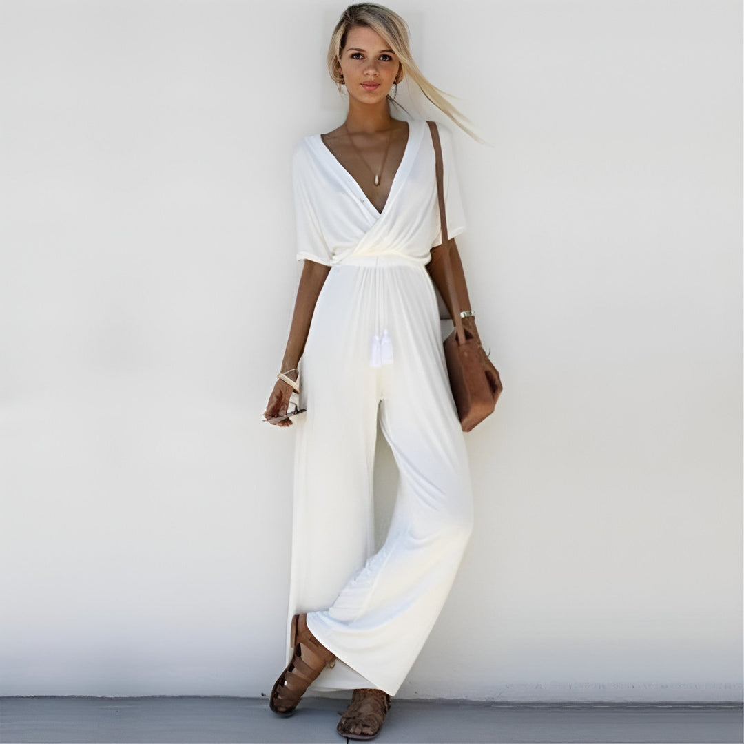 Elegant women's jumpsuit with a flattering fit for versatile day to night wear. Comfortable one-piece chic outfit.