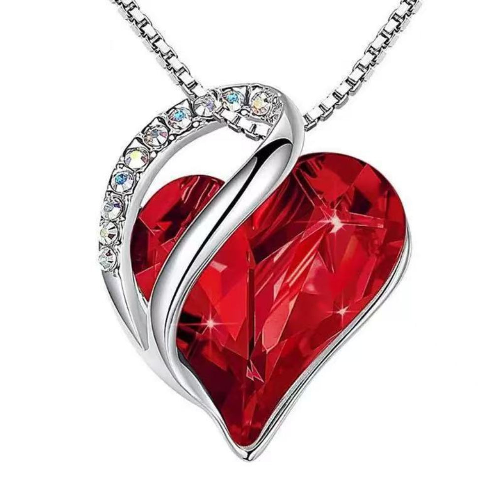 Women's geometric heart crystal pendant necklace, elegant and modern accessory for her.