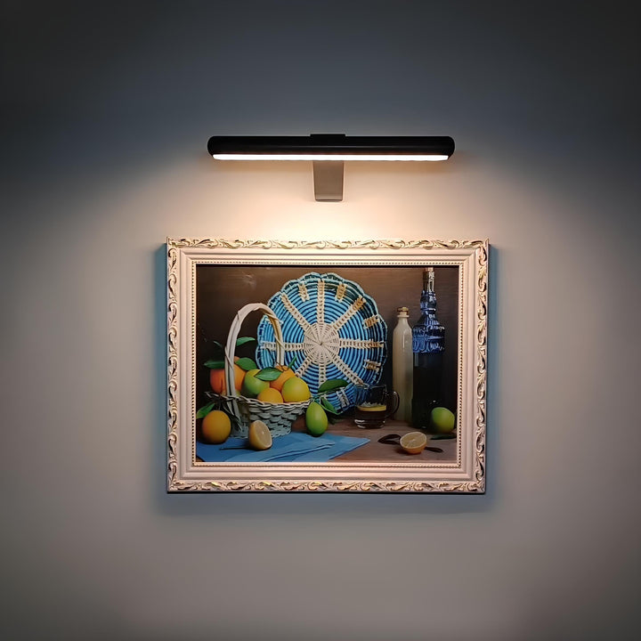 Adjustable LED art light, cordless, rechargeable, remote for gallery quality display.