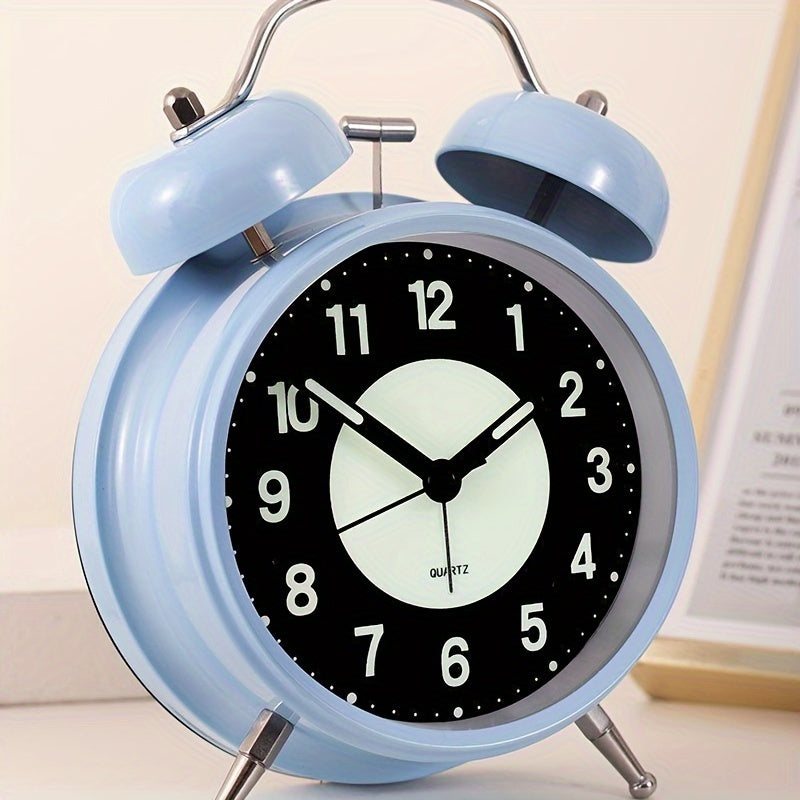 Silent black metal luminous alarm clock, perfect for heavy sleepers & bedroom decor. Easy to read glow-in-the-dark display.