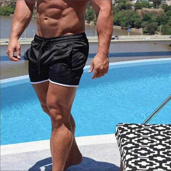 Stylish men's quick-dry drawstring swim shorts, ideal for beach, pool, or resort wear.