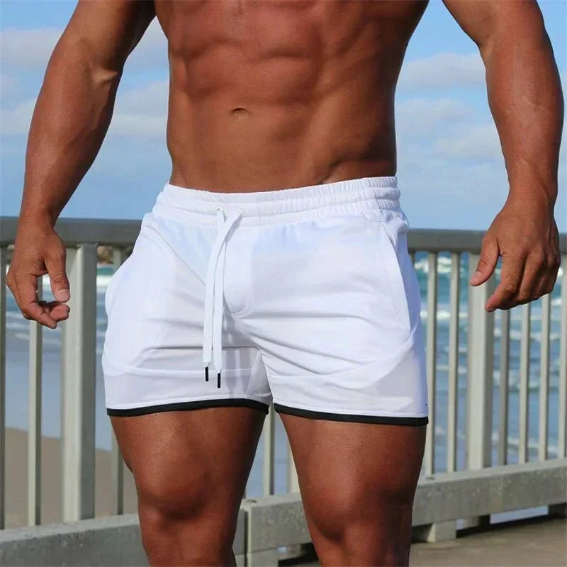 Athletic men's quick-dry drawstring swim shorts, great for swimming, beach sports & active summer.
