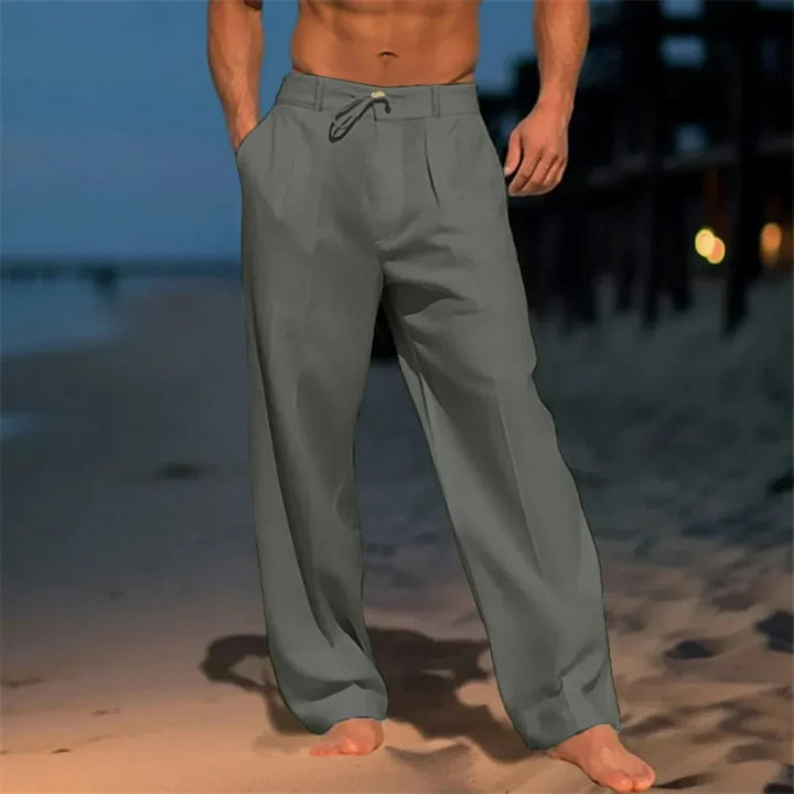 Men's relaxed fit wide leg linen drawstring pants in light color, perfect for casual summer style.
