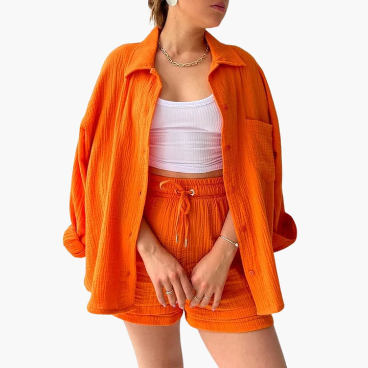 Complete summer outfit: women's relaxed fit two piece shorts set with a chic button-up top.