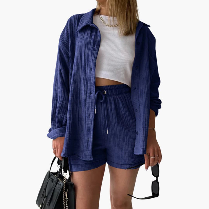 Soft fabric women's relaxed fit two piece shorts set, a stylish button-up summer outfit.