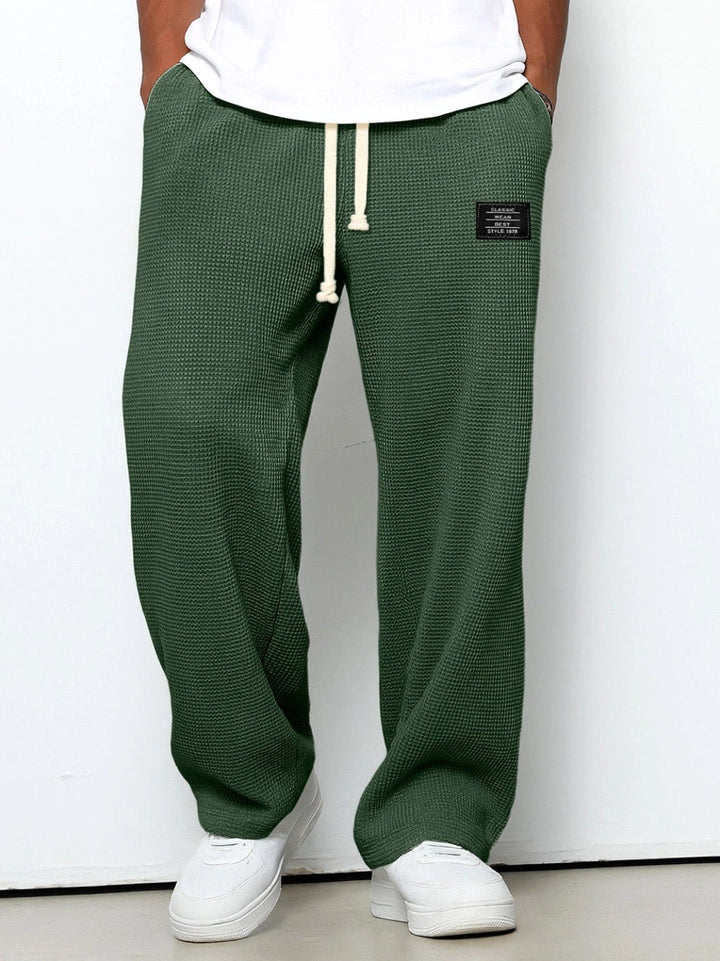 Durable men's relaxed fit casual pants, featuring a timeless straight leg for everyday wear.