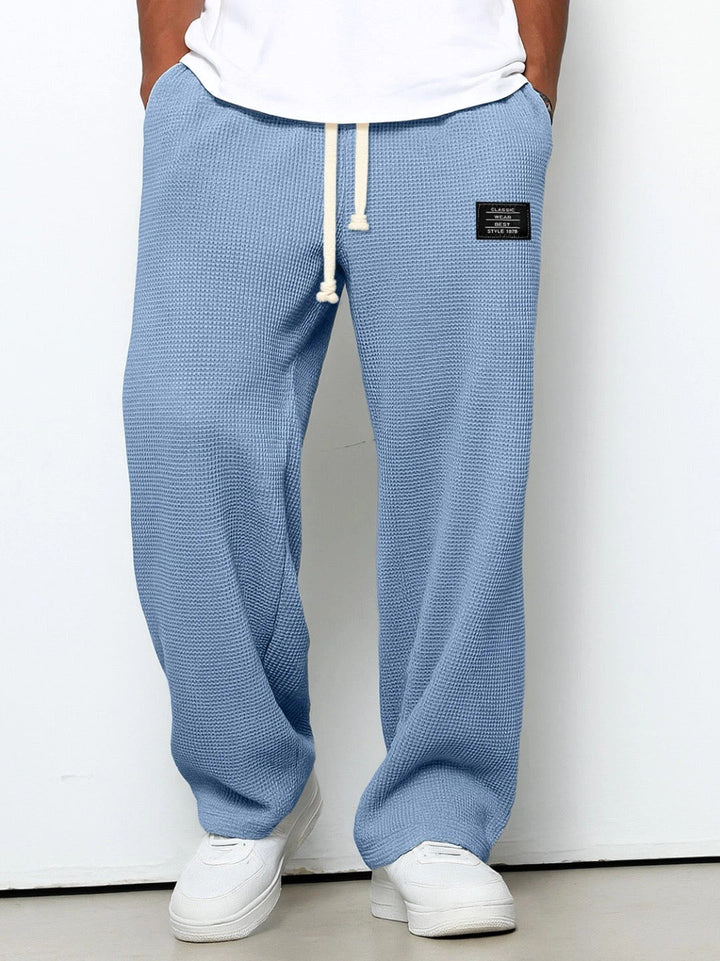 Comfortable men's relaxed fit trousers with a straight leg, ideal for daily wear and ultimate comfort.