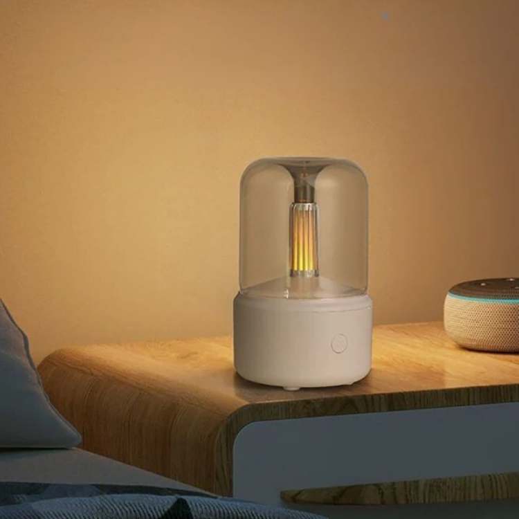 Stylish candlelight diffuser for essential oils, creating a serene ambiance and stress-relieving aroma.