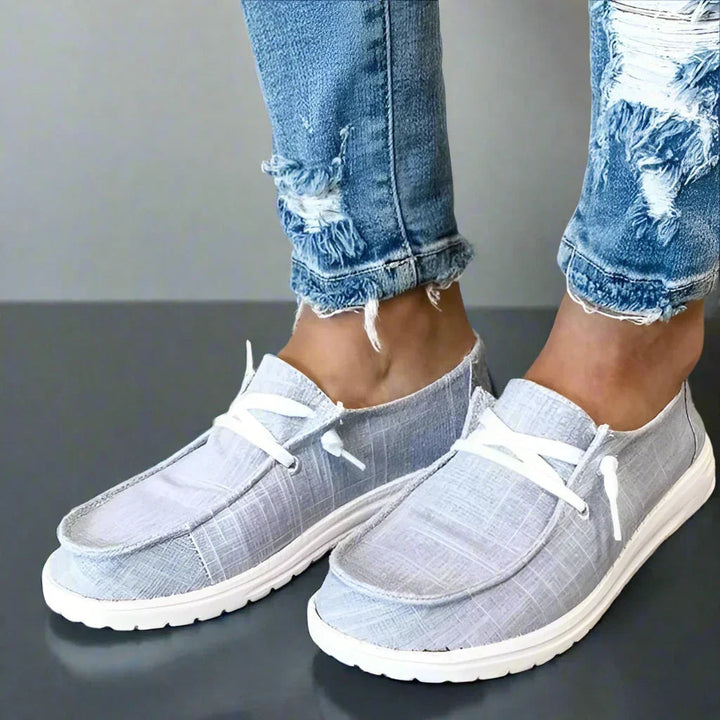 Close-up: women's comfortable bunion relief slip-on flats, soft & lightweight.