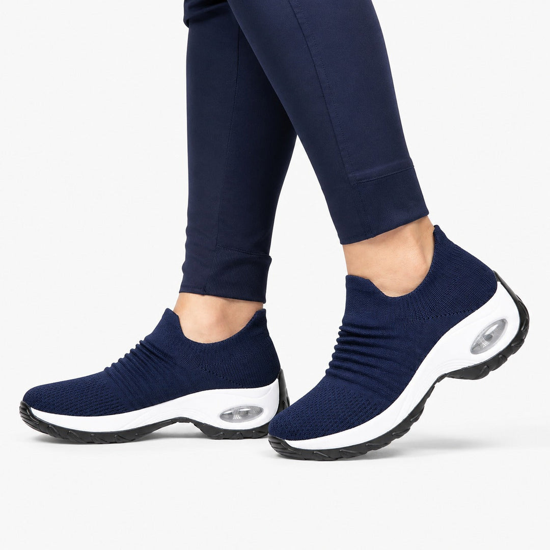 Cushioned women's walking shoes, slip-on design with non-slip sole for everyday activewear.