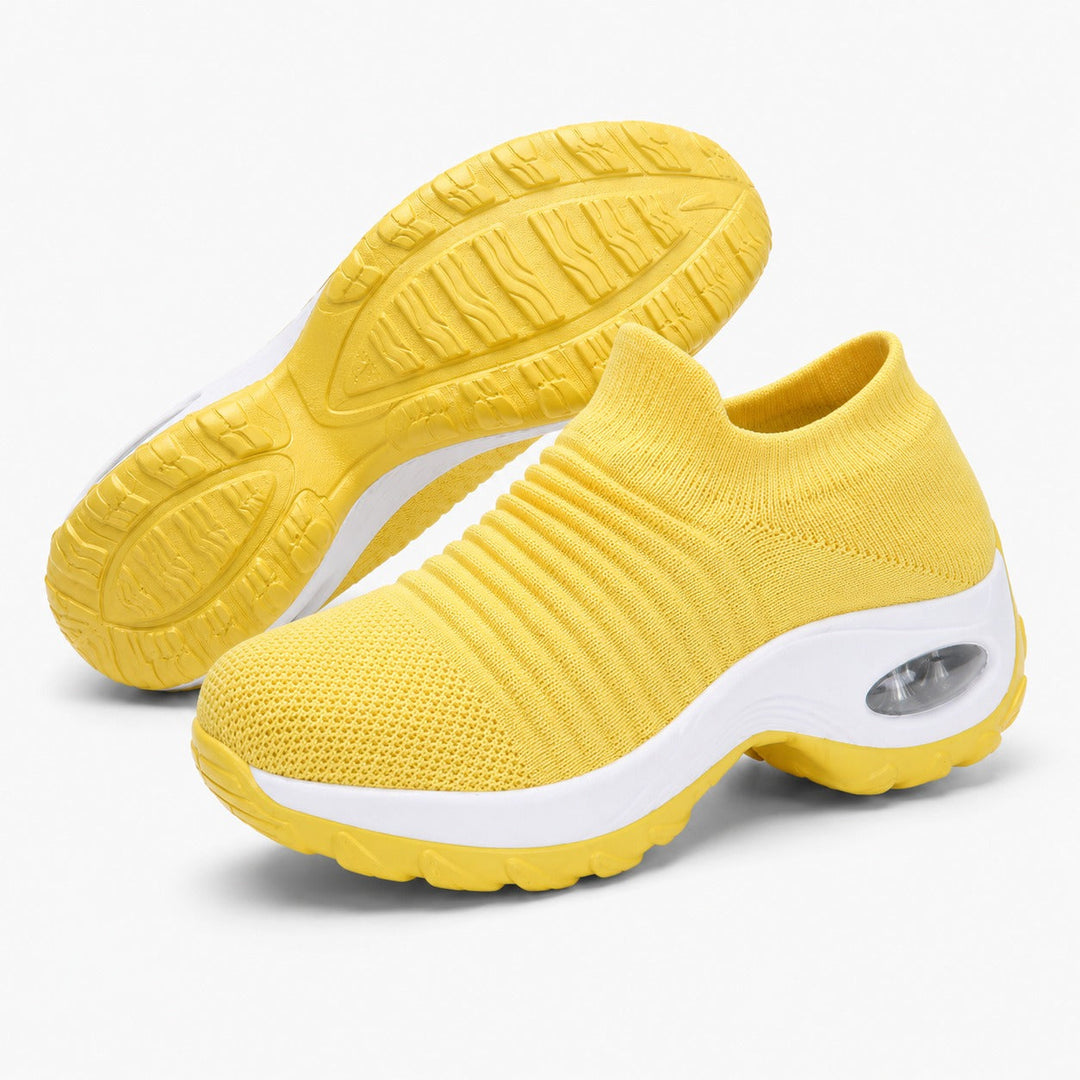 Supportive women's non-slip walking shoes, ensuring comfort & safety for all activities.