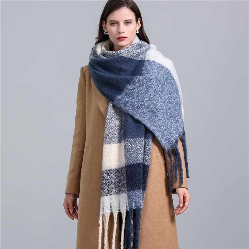 Stylish women's checked winter scarf, soft and warm, perfect for layering over winter coats.