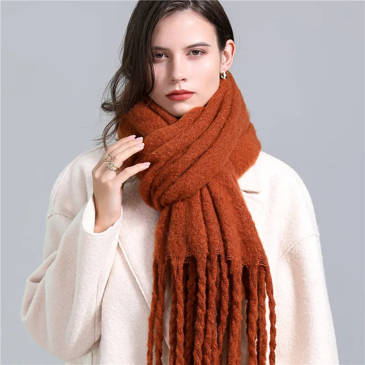 Luxurious soft cashmere-feel checked scarf for women, providing warmth and sophisticated winter fashion.
