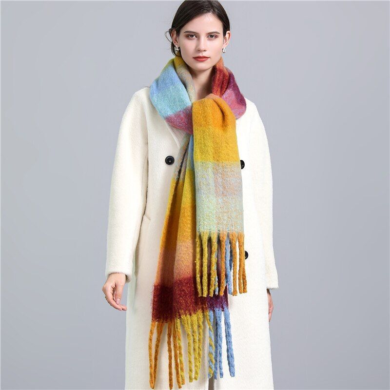 Women's luxurious soft checked winter scarf with tassels, ideal for warmth & style.