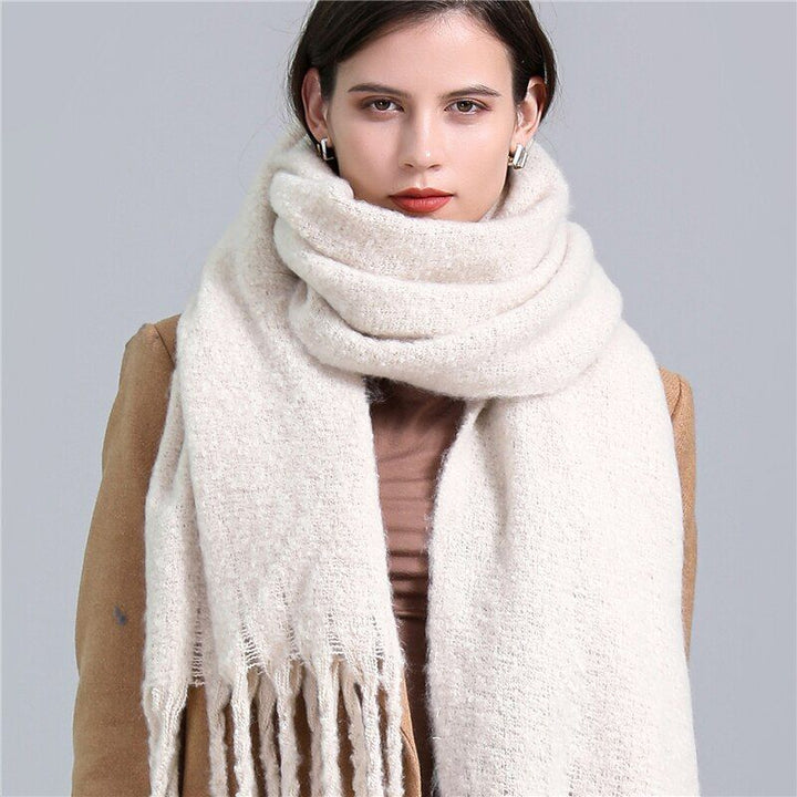Warm & soft Carmie checked winter scarf for women, a stylish and luxurious fashion accessory.