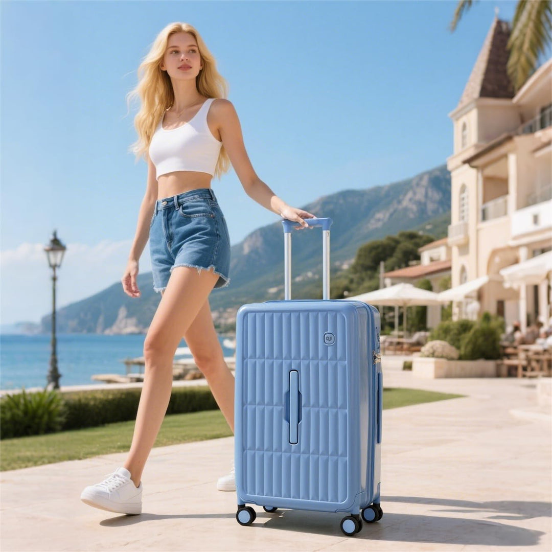 Modern hardshell travel suitcase in navy blue, featuring quiet spinner wheels & spacious interior.