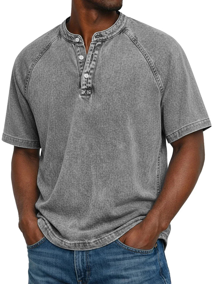 Back of men's short sleeve washed Henley t-shirt, emphasizing casual comfort and everyday style.
