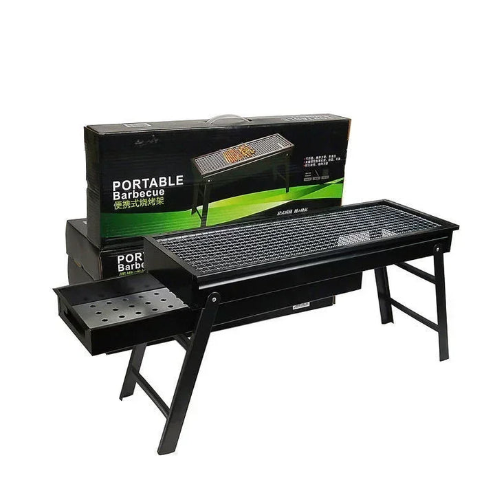 Compact folding charcoal grill for easy transport to camping, picnics & outdoor BBQ events.