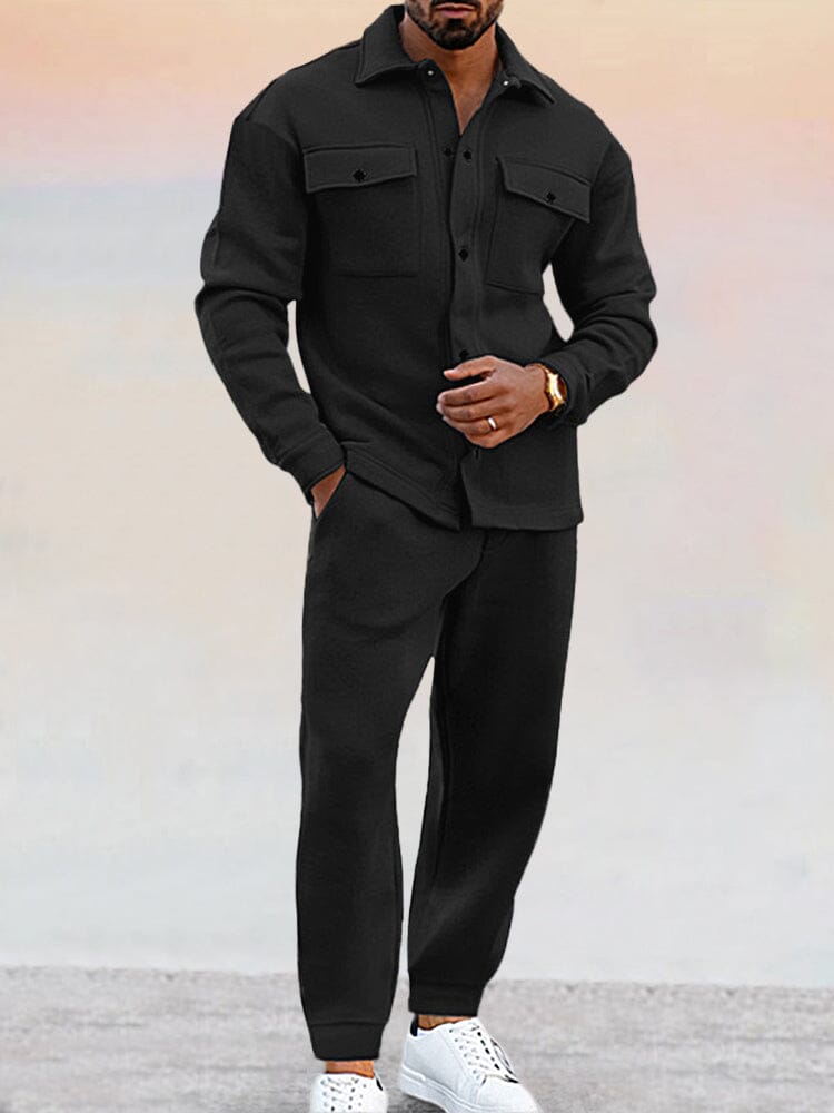 Full-body view of a man wearing a comfy two-piece men's outfit, a stylish casual tracksuit set.