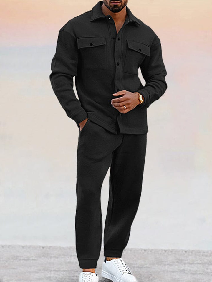 Full-body view of a man wearing a comfy two-piece men's outfit, a stylish casual tracksuit set.