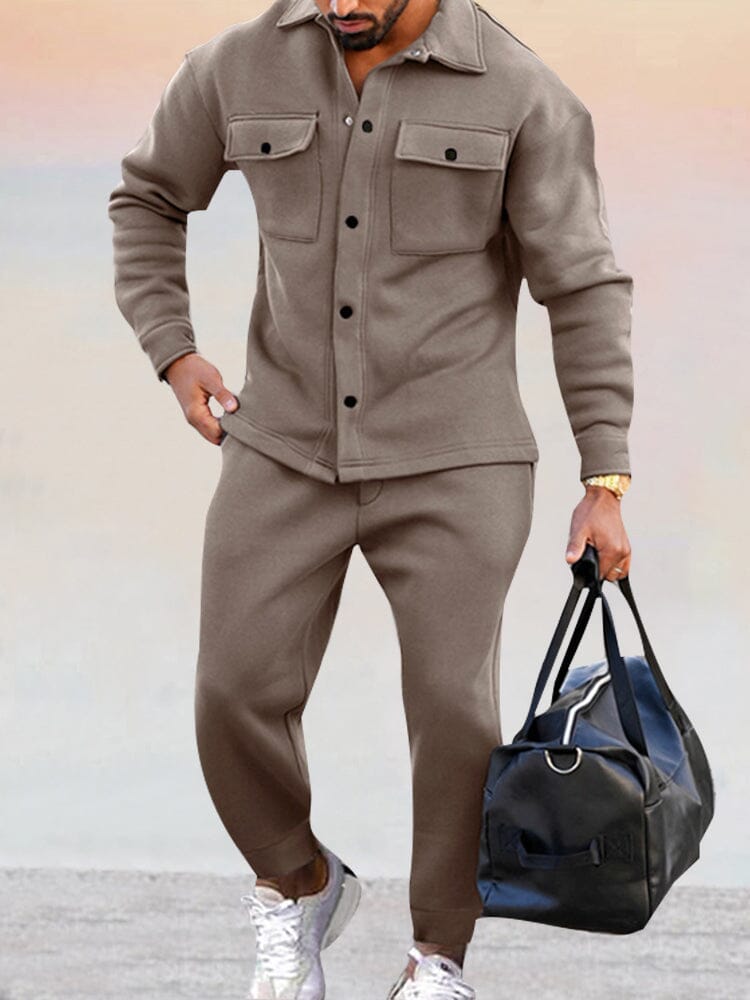Lifestyle shot of a man in a stylish men's casual tracksuit set, suitable for various activities.