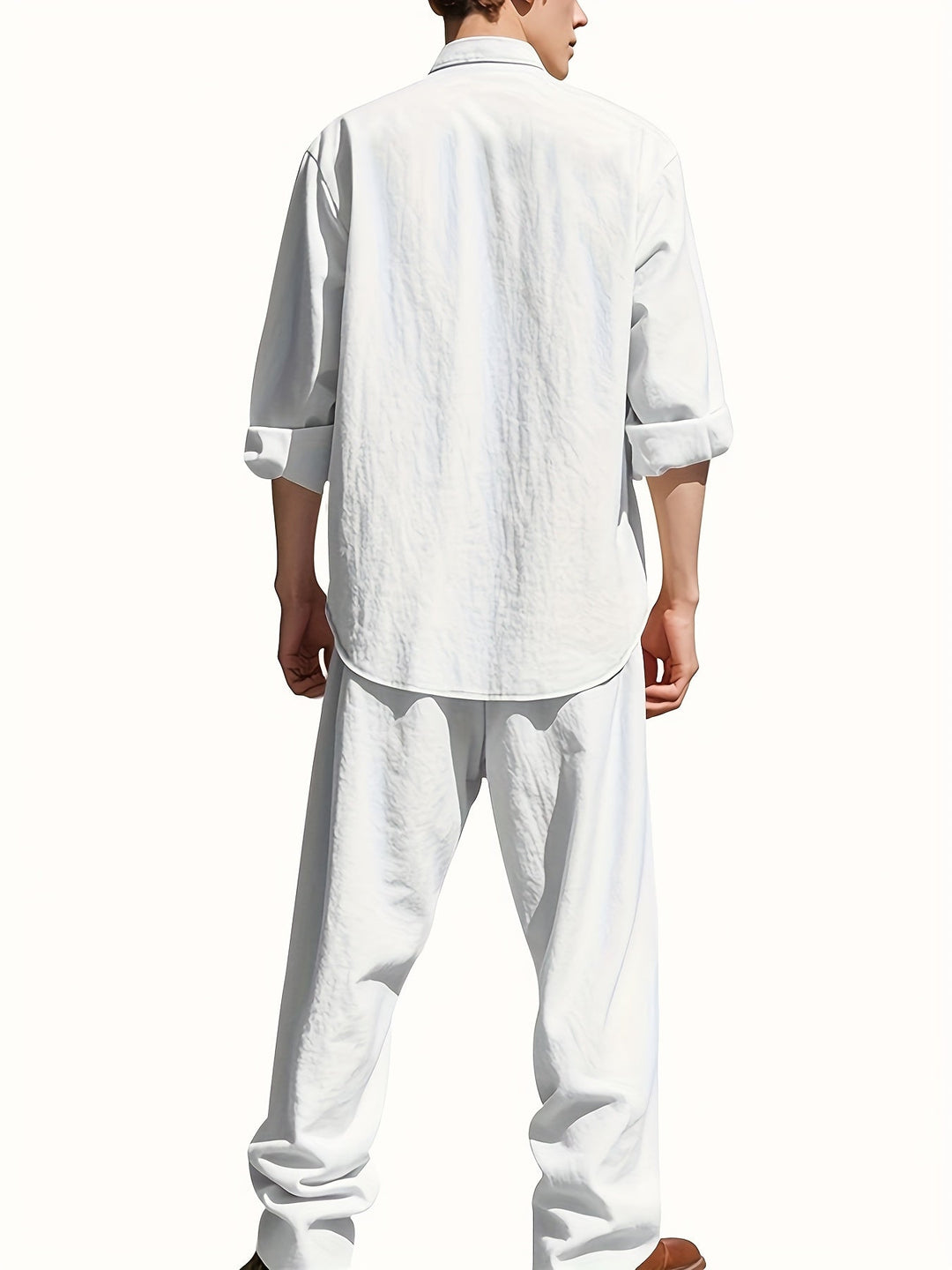 Relaxed fit men's two-piece band collar shirt & matching pants set, designed for comfort and modern style.