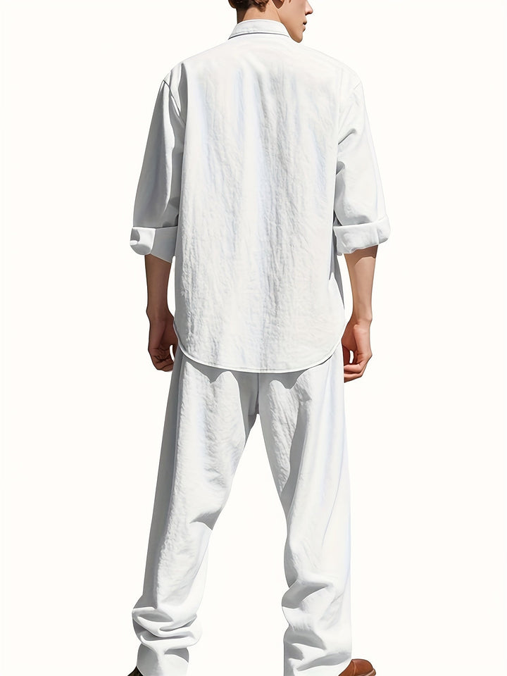 Relaxed fit men's two-piece band collar shirt & matching pants set, designed for comfort and modern style.