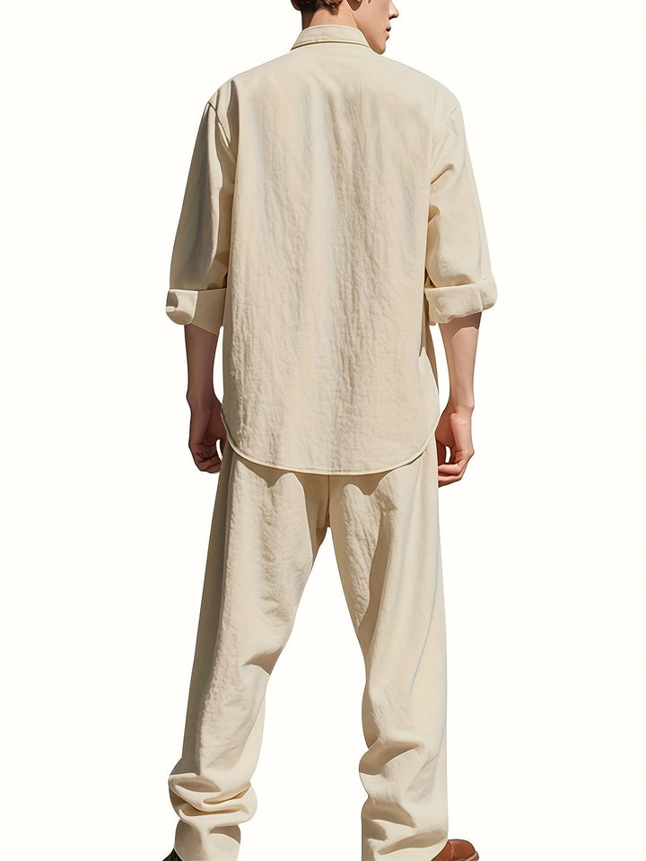 Complete men's outfit: matching band collar long sleeve shirt & comfortable pants set. Effortless casual wear.
