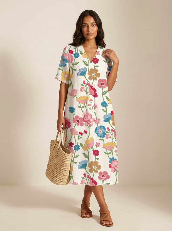 Women's casual v-neck midi dress, comfortable and stylish with a beautiful nature print, great for summer.