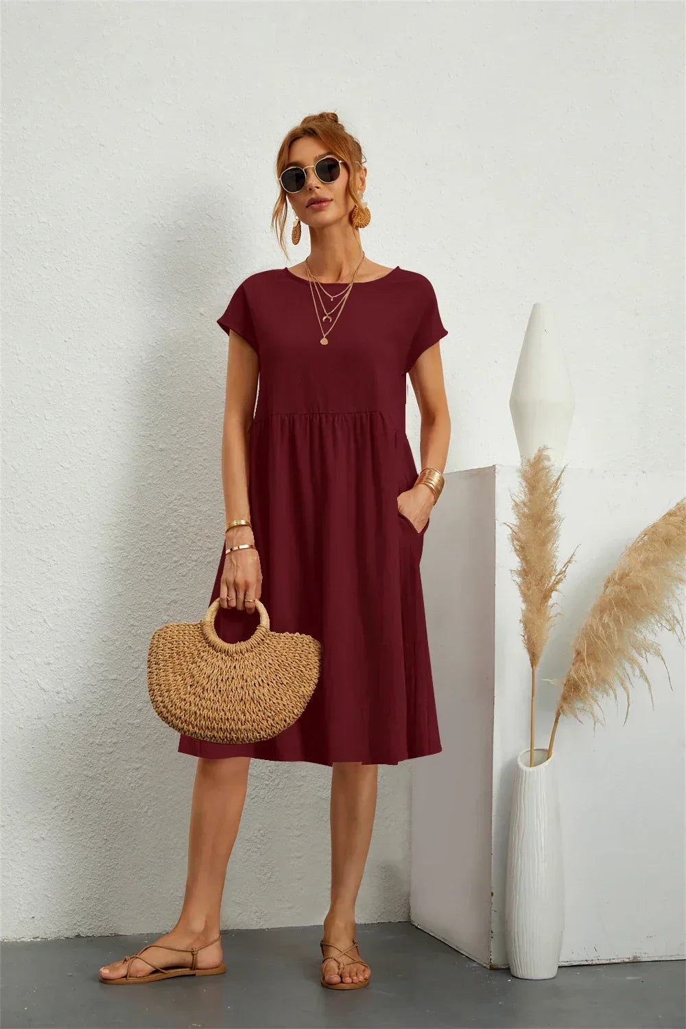 Stylish women's A-line midi dress, comfortable for everyday, with handy pockets.