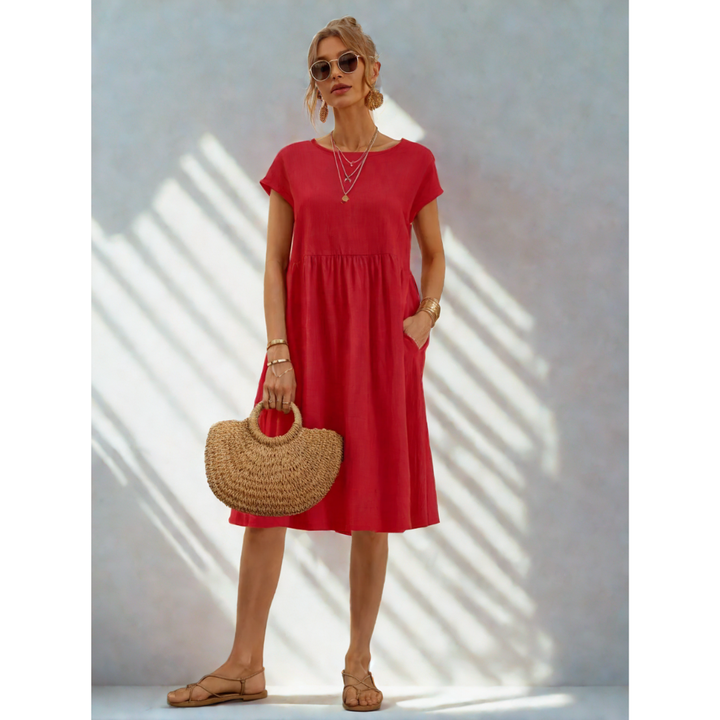 Soft women's short-sleeve midi dress, A-line cut, designed for comfort and everyday style.