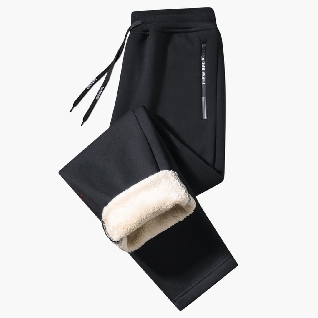 Men's sleek black jogger pants for activewear. Relaxed fit sweatpants offer comfort & modern style for training or lounging.
