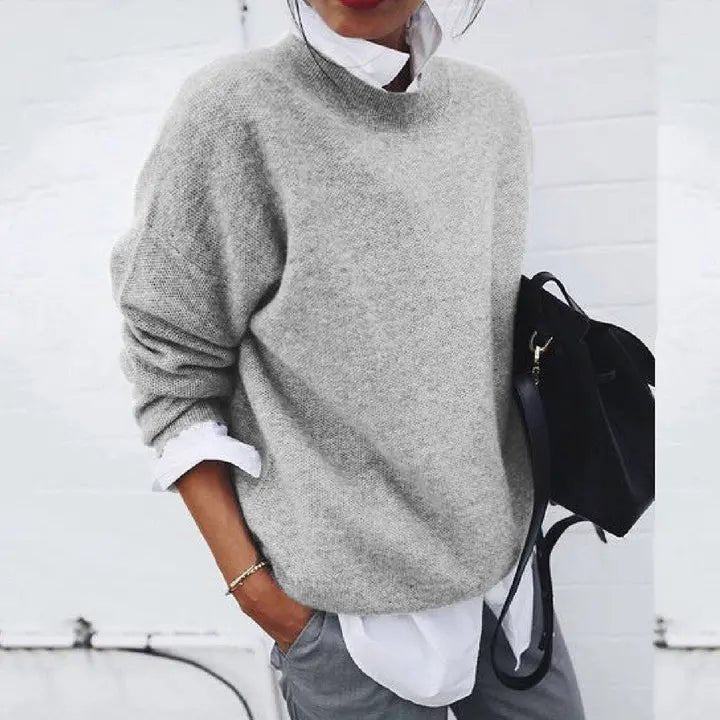 Comfortable women's relaxed fit crew neck knit sweater with long sleeves, great for everyday effortless style.