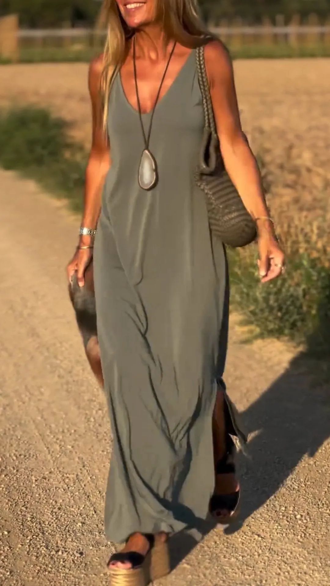 Sleeveless maxi dress for women, elegant and casual summer attire with wide waist.