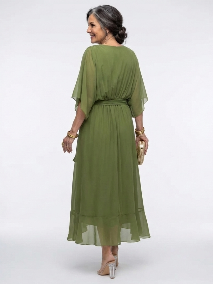 Relaxed fit women's short sleeve midi dress with draped V-neck and tie waist, a flowy summer style.
