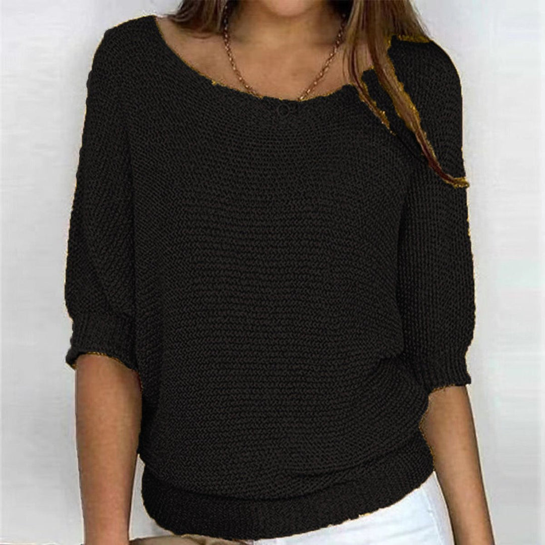 Everyday chic women's relaxed batwing sweater. Oversized fit knit for stylish and cozy casual wear.