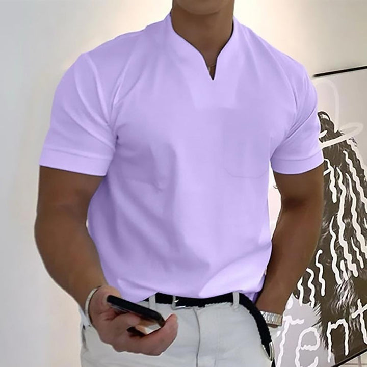 Men's classic collared polo shirt showing refined details. Smart casual short sleeve top.