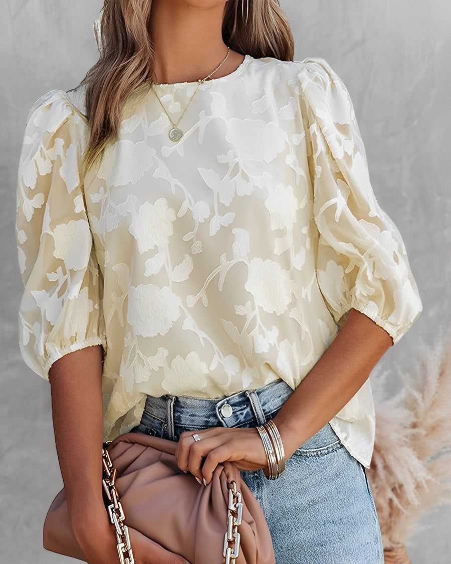 Women's elegant puff sleeve blouse, a sophisticated long sleeve top creating a chic, versatile outfit.