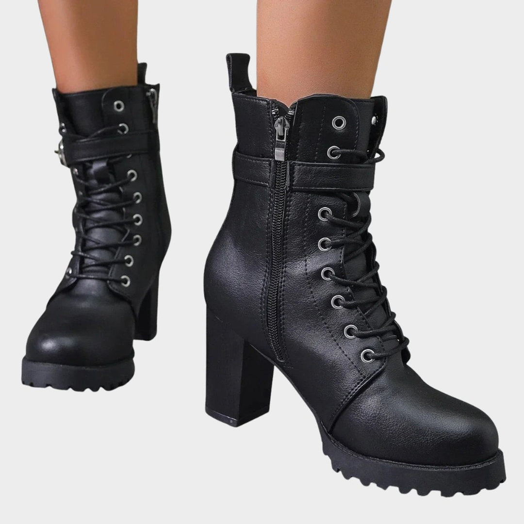 Edgy women's combat ankle boots with lace-up front, robust block heel. Ideal for fall & winter style.