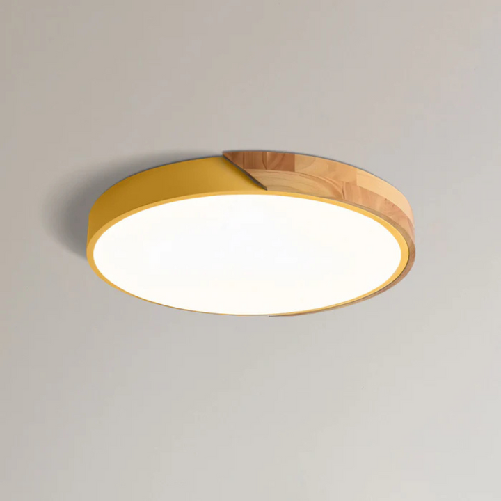 Stylish round wood LED ceiling fixture, dimmable, offering warm ambient light for any room.