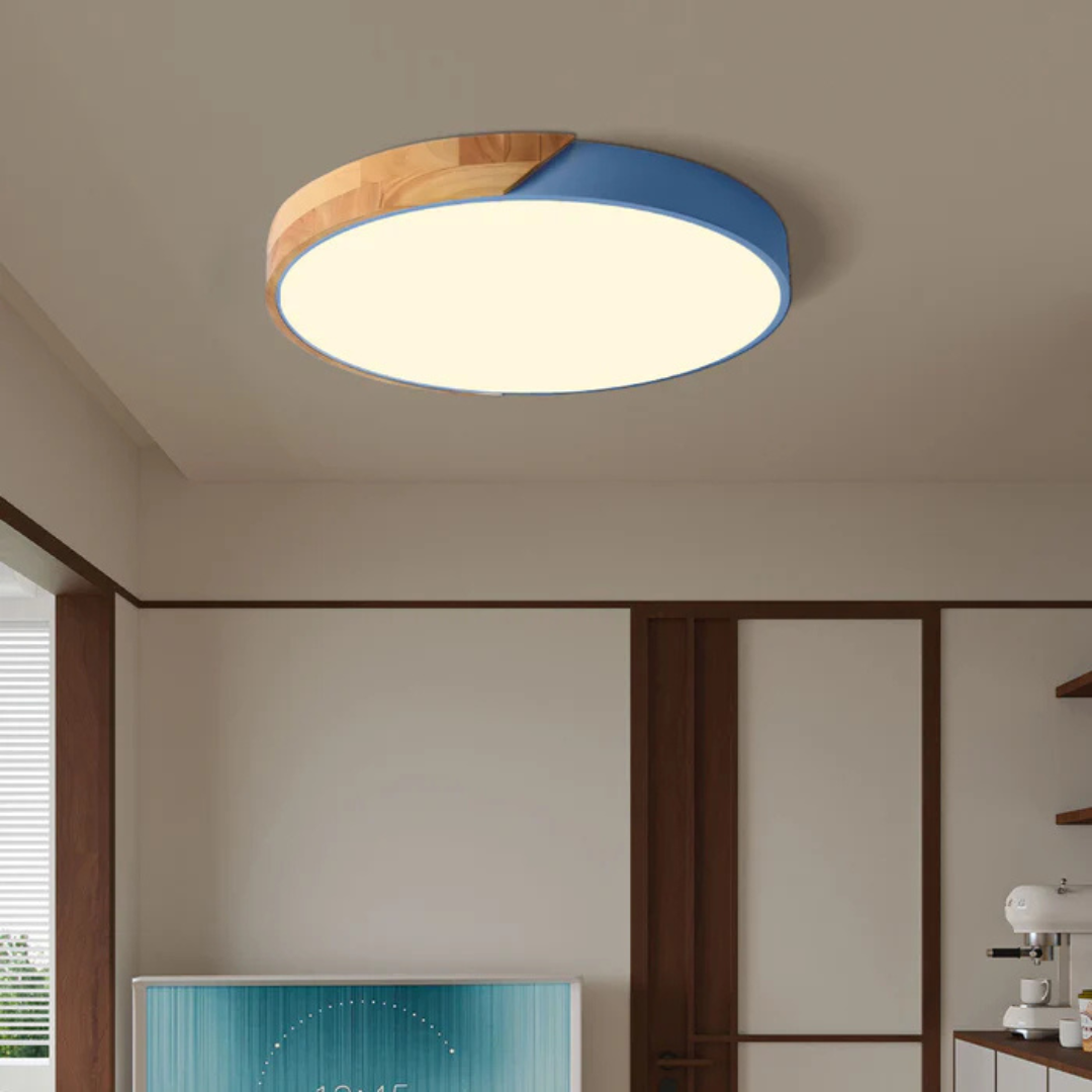 Contemporary round LED ceiling light, sleek wood finish, perfect for minimalist living spaces.