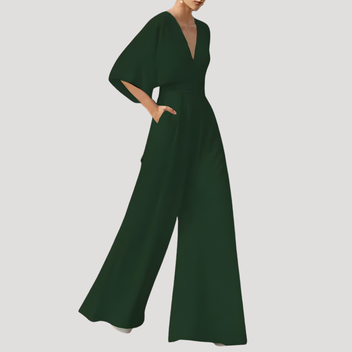 Celeste women's V-neck wide leg jumpsuit. Elegant, flowy, and comfortable one-piece for versatile summer style.